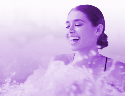 young woman smiling in a spa pool