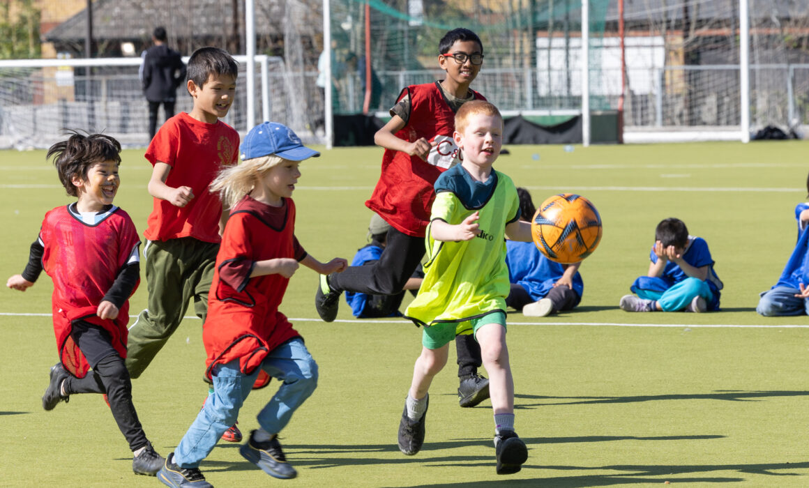 A photo of some young boys playing football