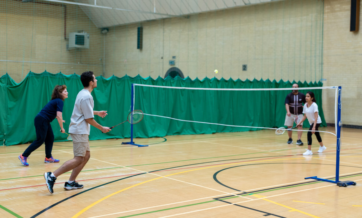 People playing badminton.