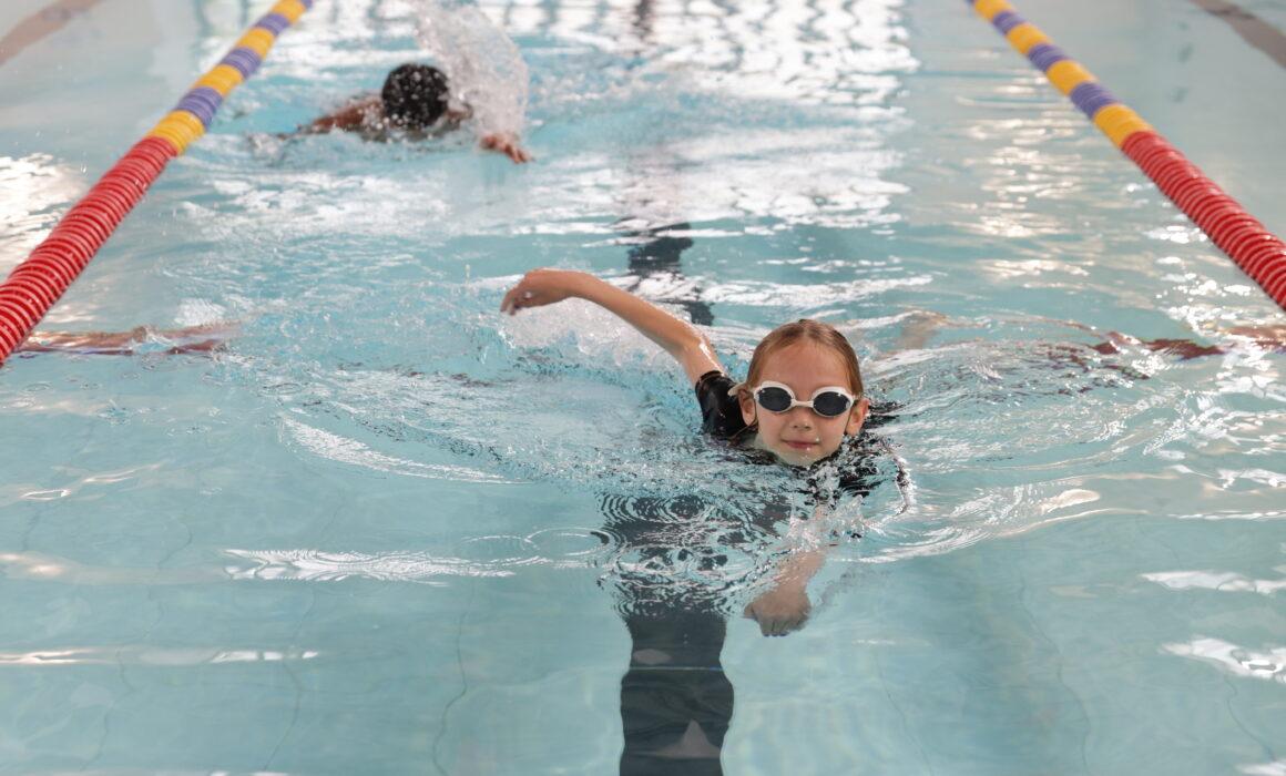 A photo of a young girl swimming